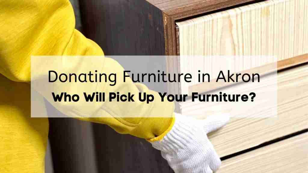 Worker helping move an Akron furniture donation to a storefront.