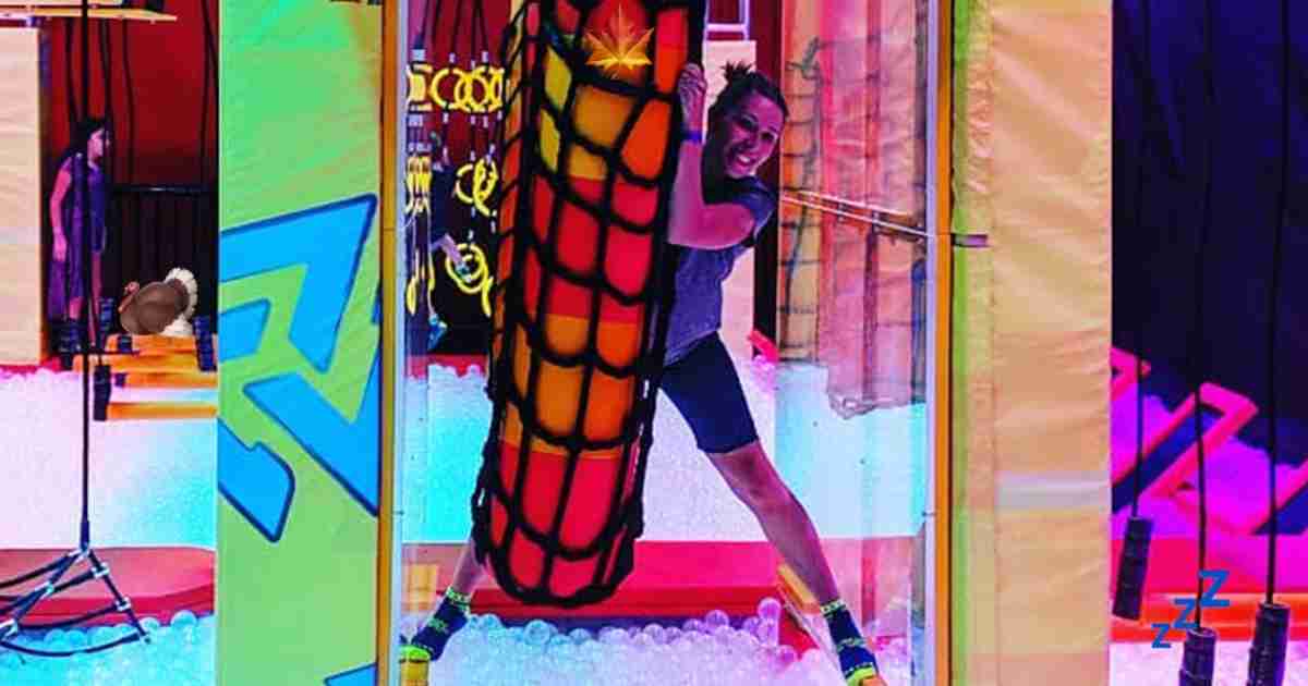 Someone on the ropes course at Urban Air