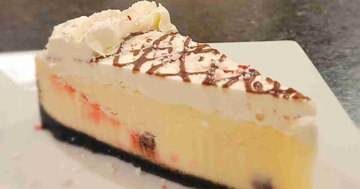 A slice of cake on a white plate at Watt Street Tavern