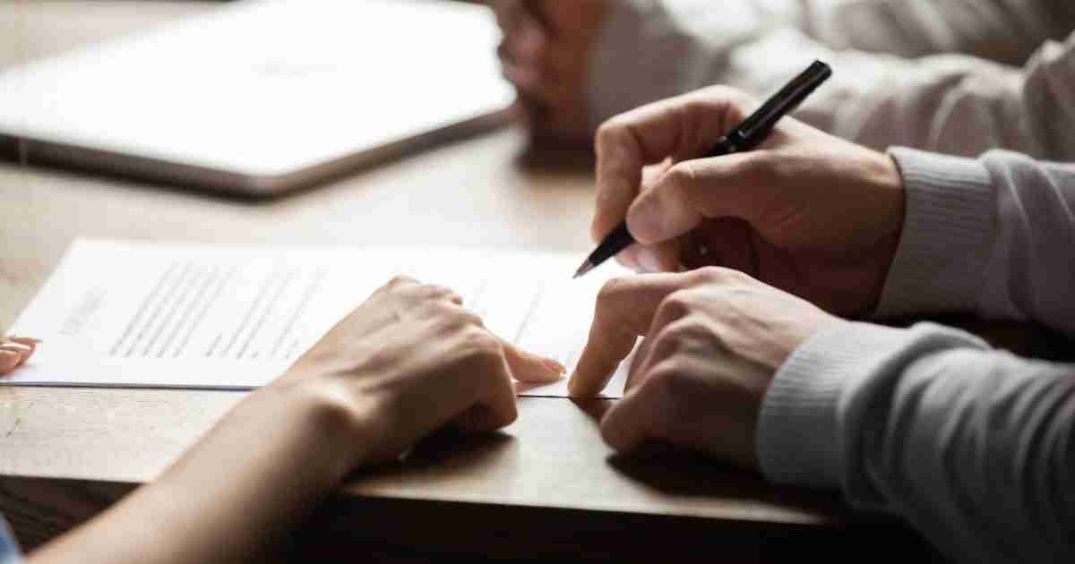 Signing mortgage paperwork. 