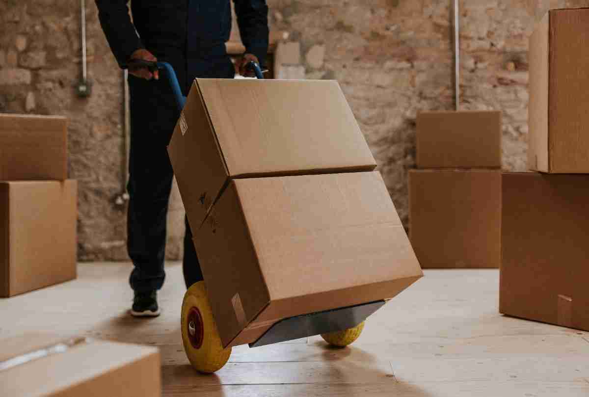 A Hide-A-Way Hills mover transporting a box on a dollie 